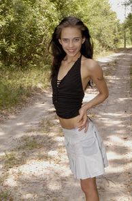 Thin Girl On A Country Road